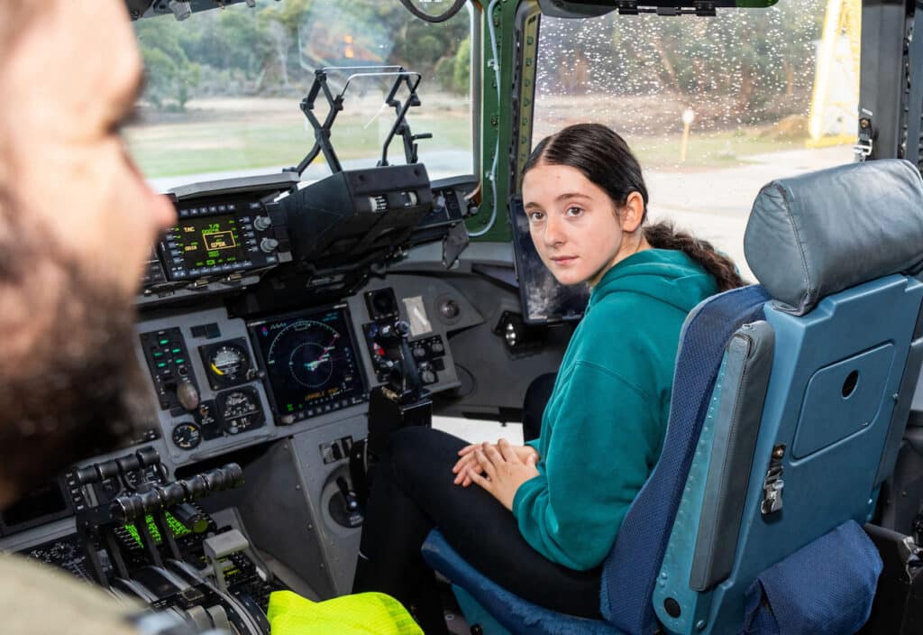 (l-r) Air Force Indigenous Youth Program participants Abby Morton and Lachlan Delphin enjoy a tour of a C-17 Globemaster III provided by No. 36 Squadron at RAAF Base Pearce, Western Australia.